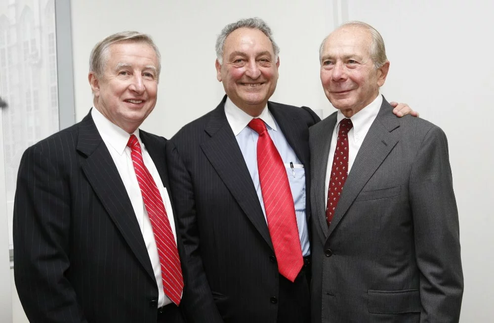 Mr. Greenberg, Sanford Weill, and Dr. Antonio Gotto stand together smiling.