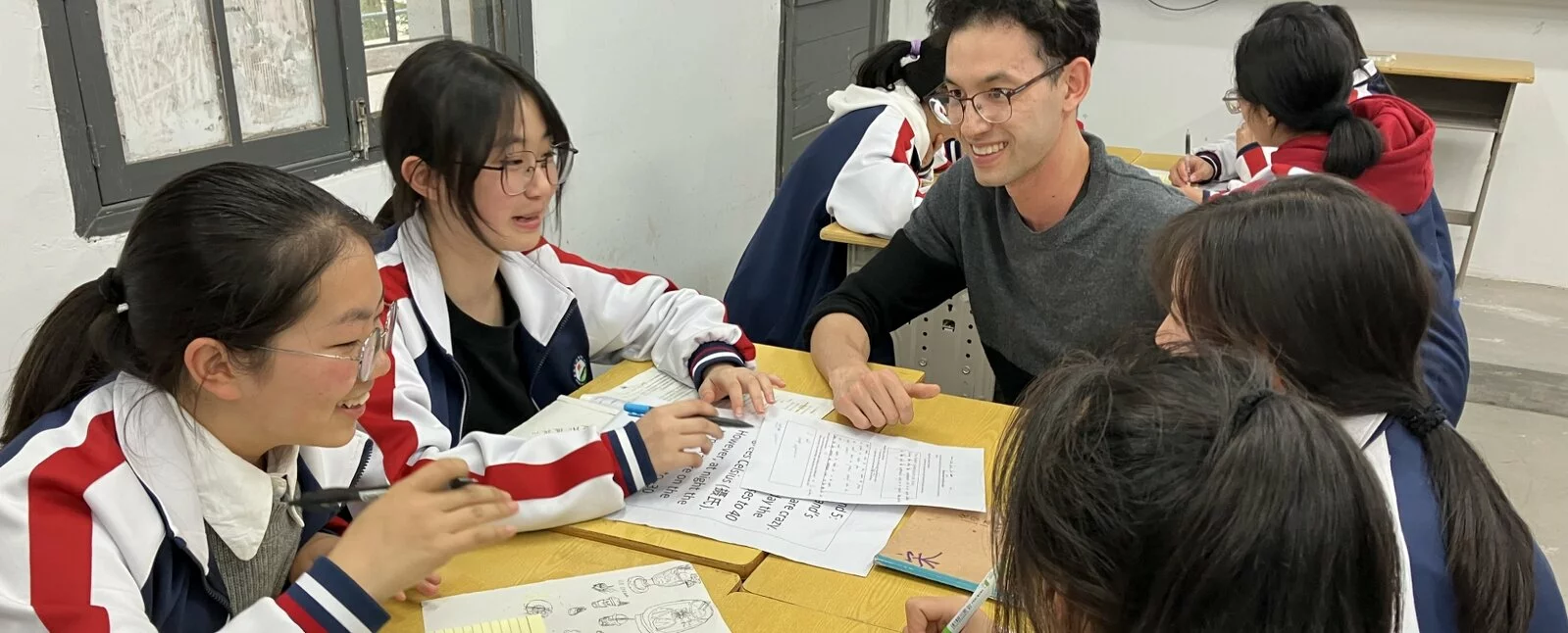 International students gathered around a table