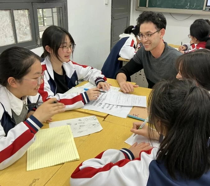 International students gathered around a table