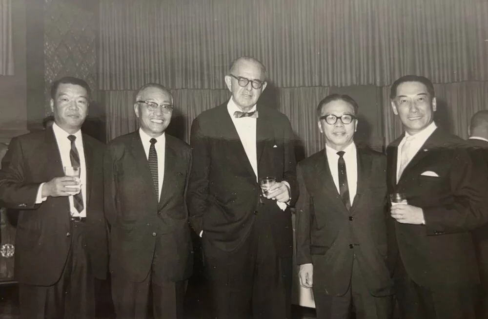 Five men, including Mr. Starr, Mr. KK Tse, and Mr. Lin, stand together smiling for the camera.